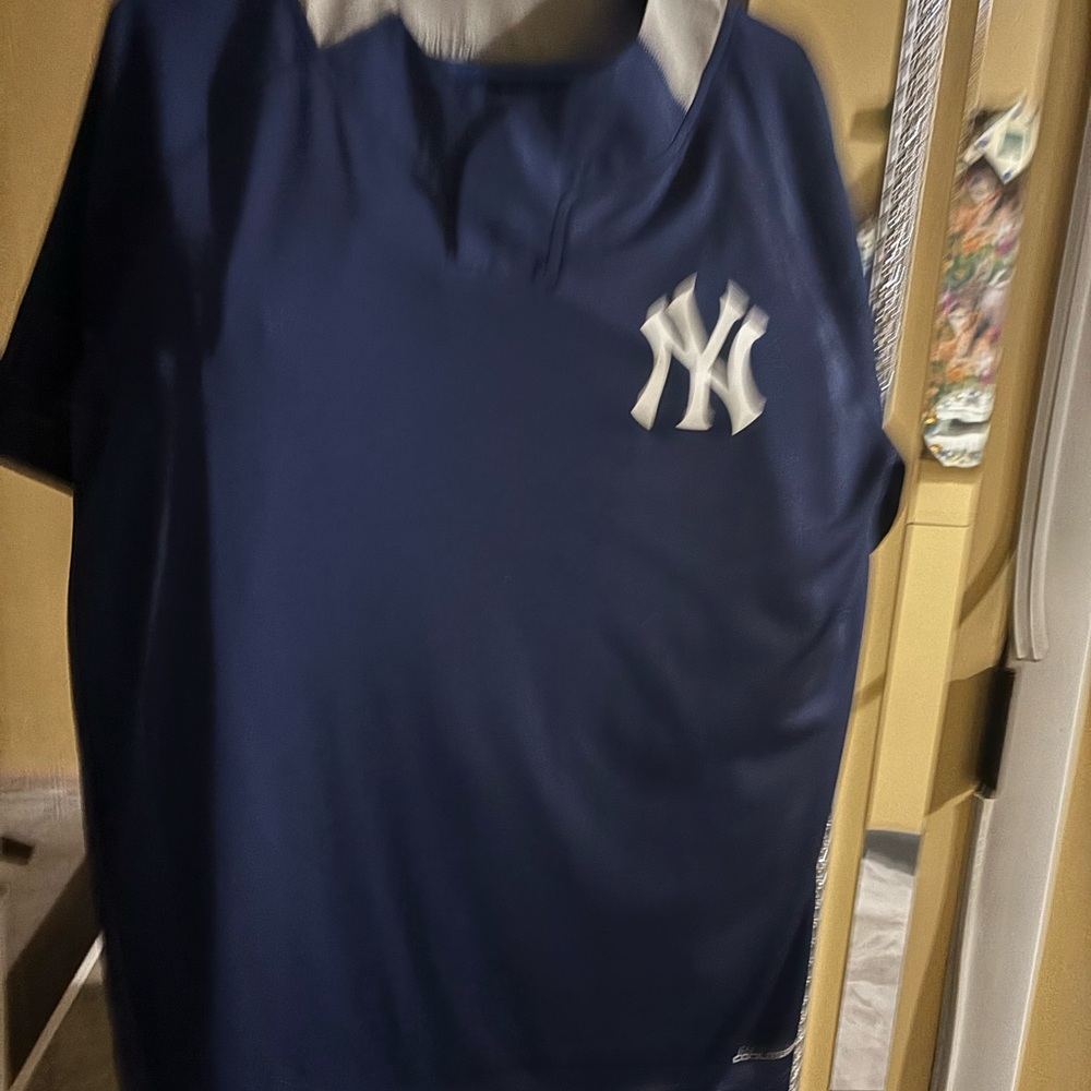Majestic Navy blue  Jersey with NY Logo Yankees size large never worn no tags